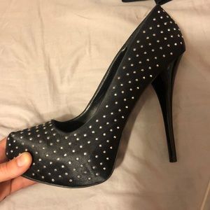 Black studded pumps
